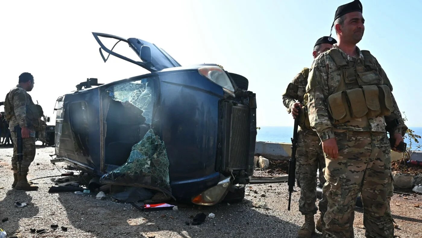 Lebanese army soldiers secure the site of an Israeli drone attack that targeted a vehicle on the highway of Saadiyat, south of Beirut, on 16 April 2026 (Fadel Itani/AFP)
