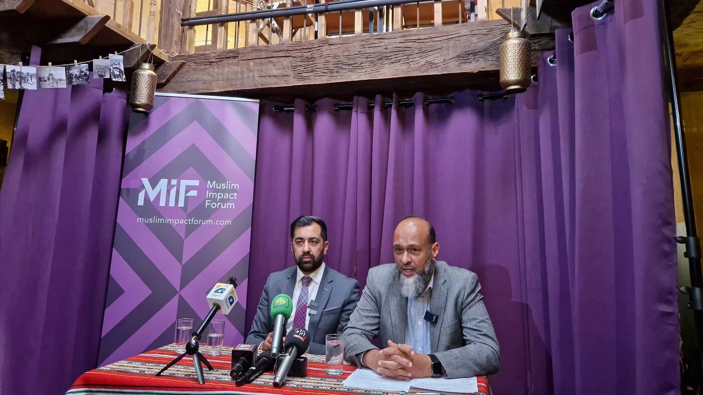 Humza Yousaf (L) and Javed Khan (R) at the Muslim Impact Forum Launch at Palestine House on 25 September (Imran Mulla/MEE)