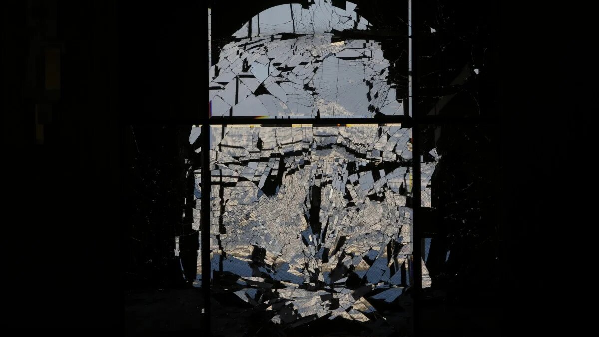 A shattered mirror inside the Beirut International Exhibition and Leisure Center