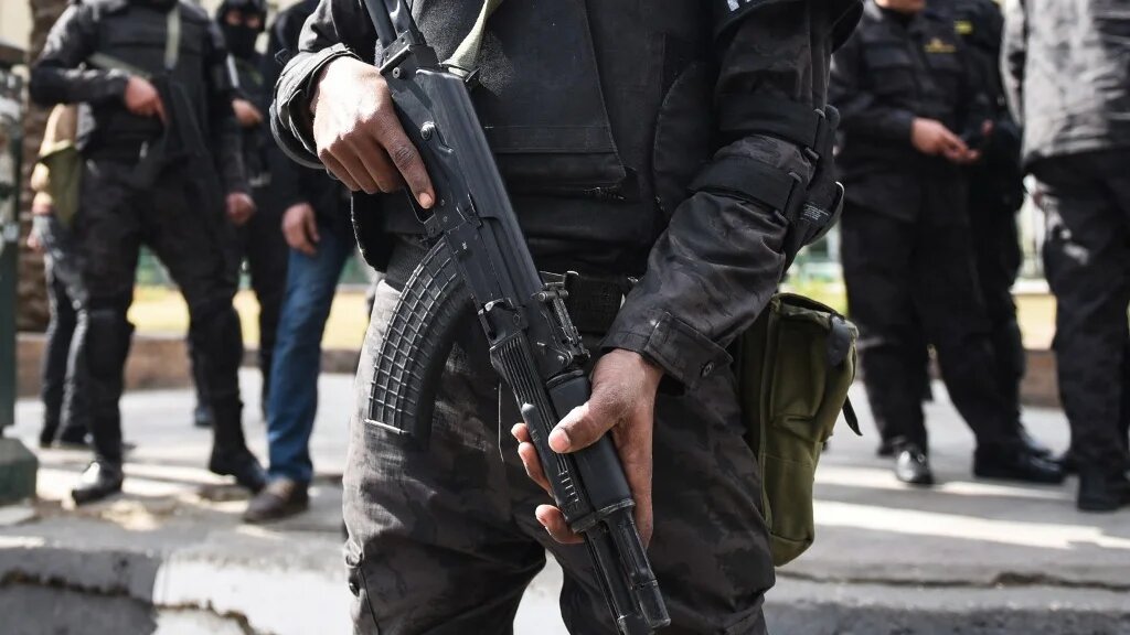 Members of the Egyptian police special forces stand guard in Cairo's Tahrir Square on 25 January 2016, as the country marked the fifth anniversary of the 2011 uprising (AFP)