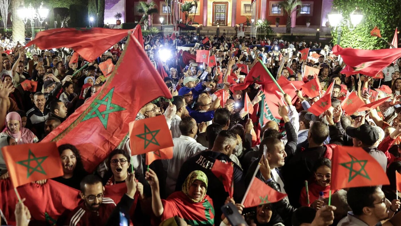 Moroccans celebrate the UN Security Council's backing of Morocco's autonomy plan for Western Sahara in Rabat, 31 October 2025 (Abdel Majid Bziouat/AFP)