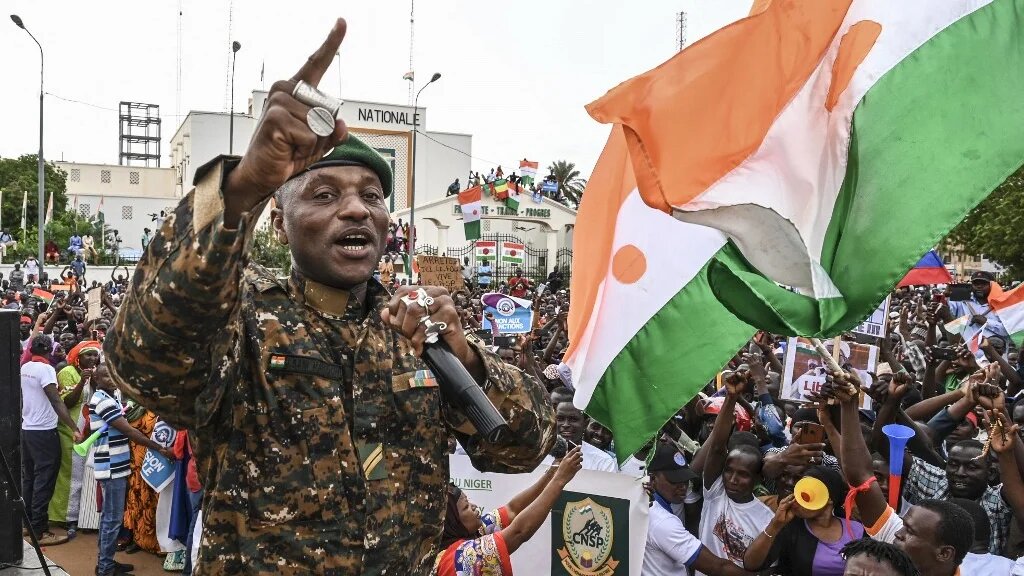 Niger's Army sergeant and artist Maman Sani Maigochi performs as supporters of Niger's National Concil of Sefeguard of the Homeland (CNSP) gather at Place de la Concertation in Niamey on August 20, 2023. (AFP)
