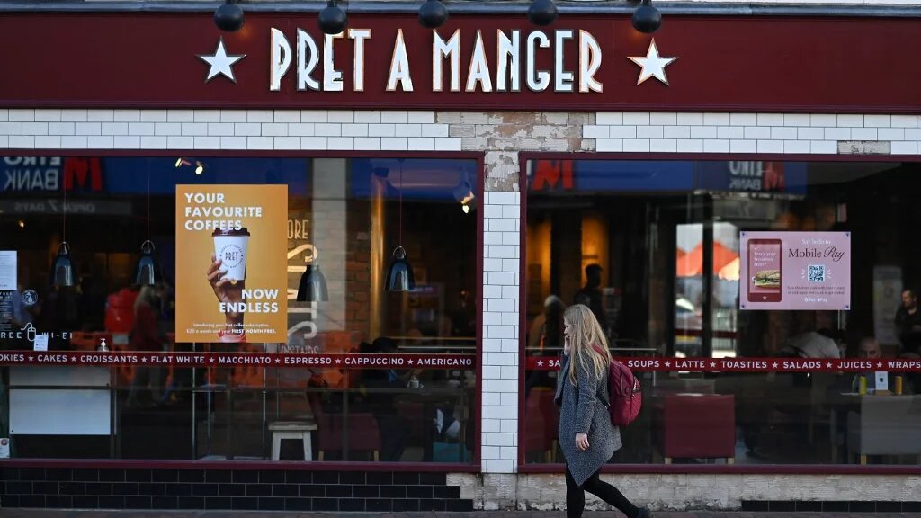 A woman walks past a Pret A Manger shop in Royal Tunbridge Wells, southwest England, on 29 September 2020 (Ben Stansall/AFP)