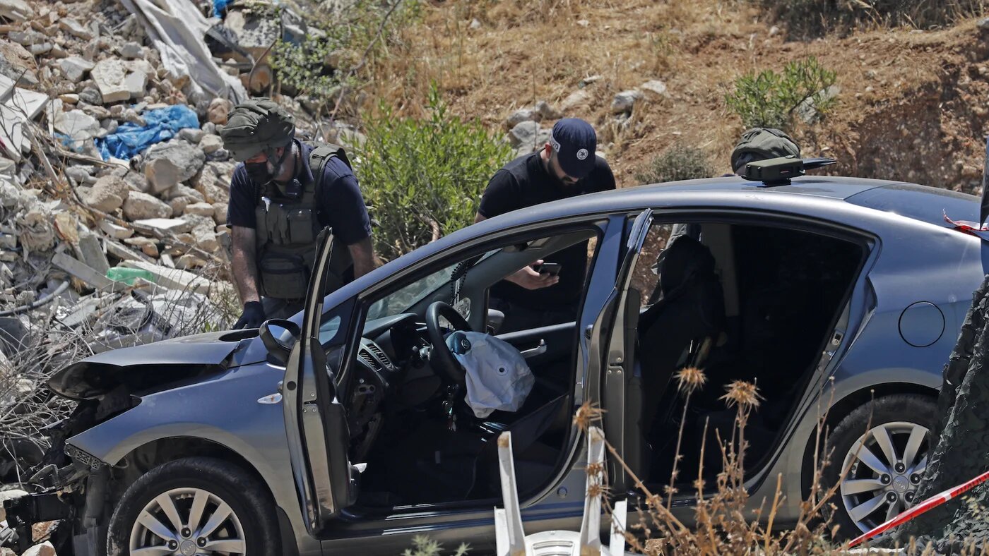 Palestinian woman car israeli soldiers AFP