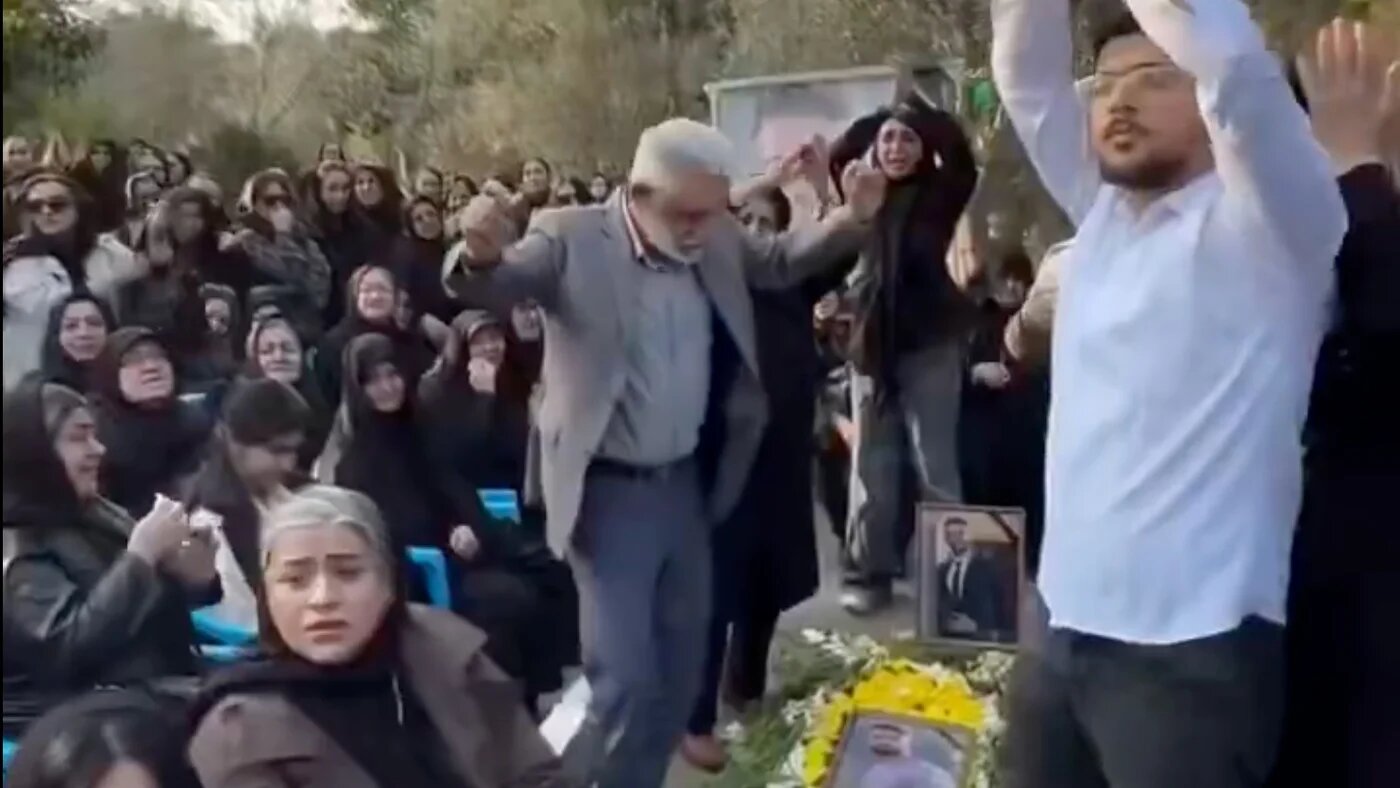 Reza Asadi's father dances at his funeral in Iran (social media)