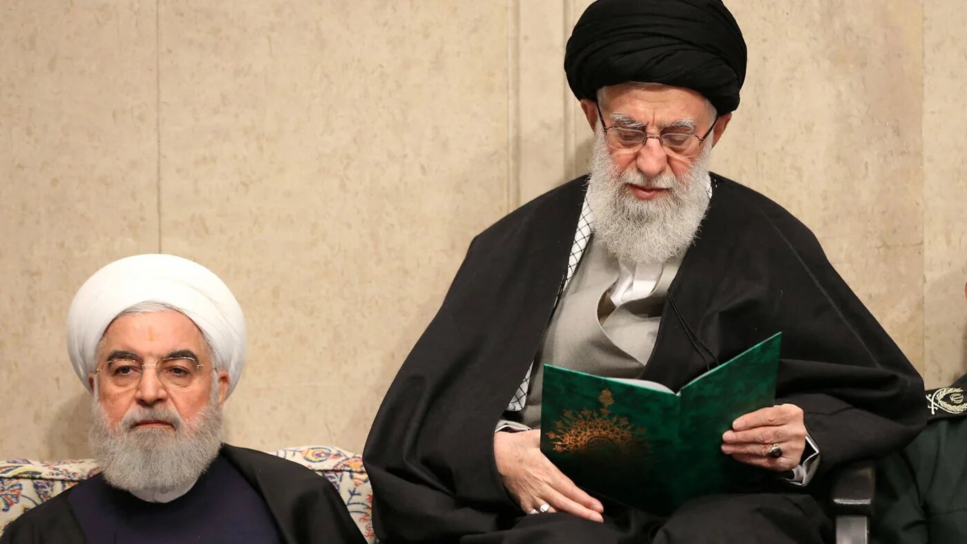 Iran's Supreme Leader Ayatollah Ali Khamenei (R) and then president Hassan Rouhani pictured during a mourning ceremony in Tehran for slain top general Qasem Soleimani, 9 January 2020 (AFP)