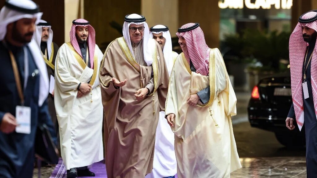 Saudi Foreign Minister Faisal bin Farhan Al-Saud (R) welcomes his Bahraini counterpart Abdullatif bin Rashid al-Zayani (2-R), before an Arab officials' meeting in Riyadh on January 12 2025, to be followed by a second meeting featuring top diplomats from the Middle East and Europe to discuss Syria (Fayez Nureldine / AFP)