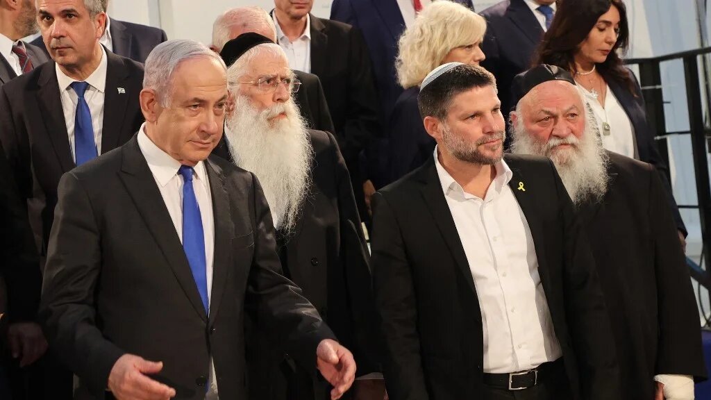 Israeli Prime Minister Benjamin Netanyahu (L) and Finance Minister Bezalel Smotrich (2nd R) arrive for a cabinet meeting at the Bible Lands Museum in Jerusalem on 5 June 2024 (AFP)