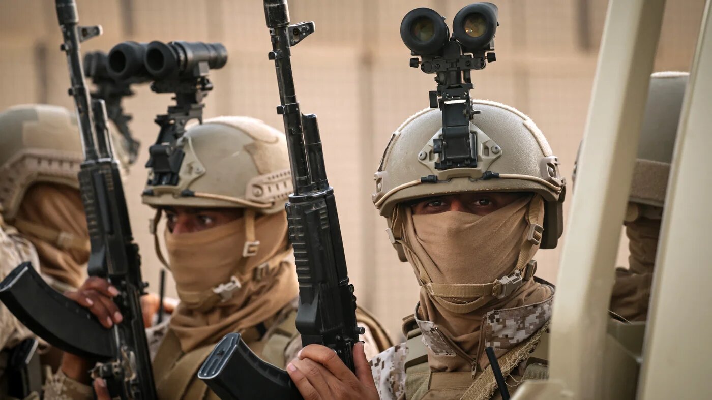 Saudi-backed Yemeni counter terrorism forces hold their weapons at Al-Riyan airport in the city of Mukalla in Yemen's coastal southern Hadramawt province on 19 January 2026 (AFP)