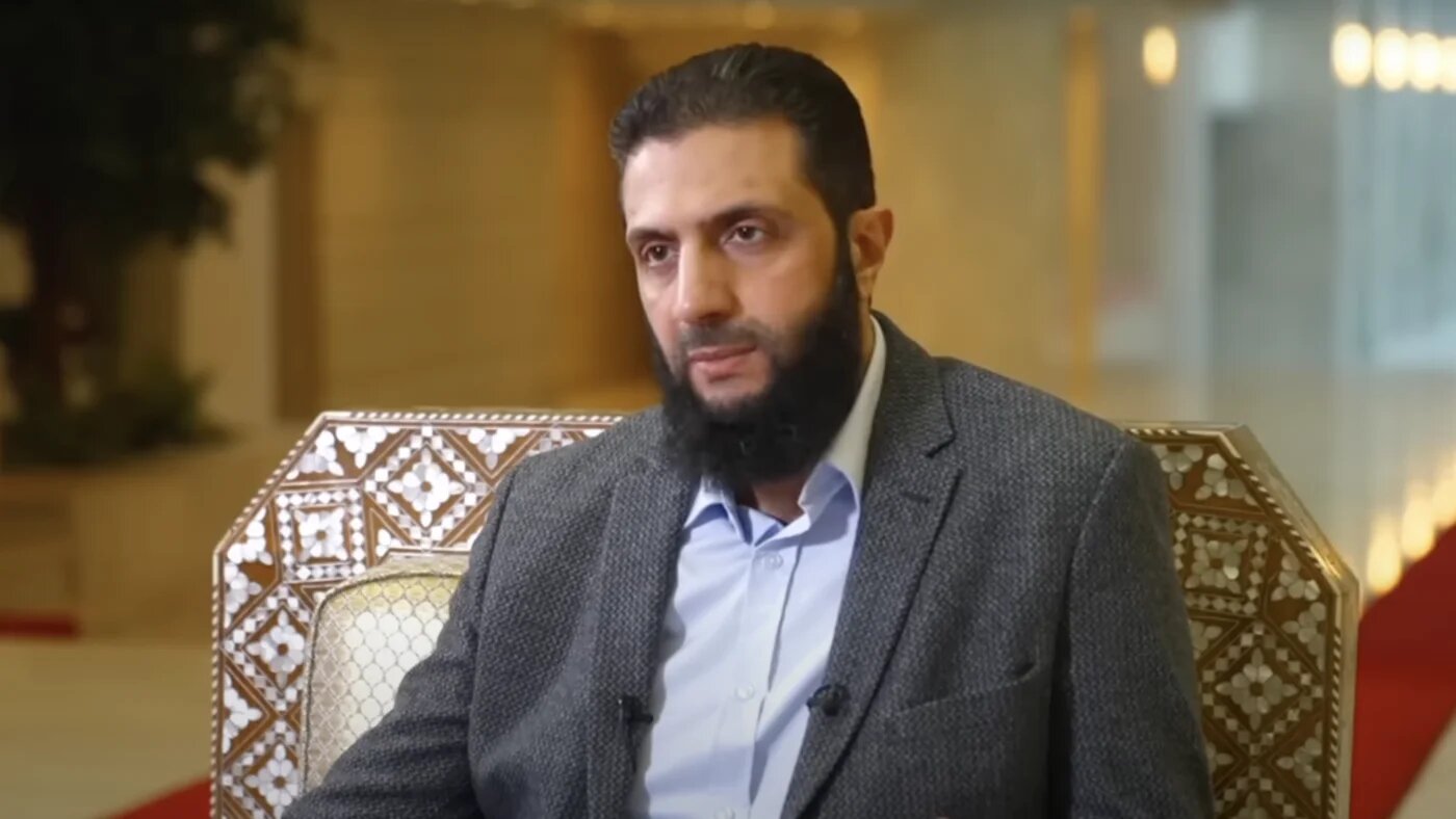 BBC International Editor Jeremy Bowen interviews Ahmed al-Sharaa in Damascus, December 19, 2024. (Credit: BBC screenshot)