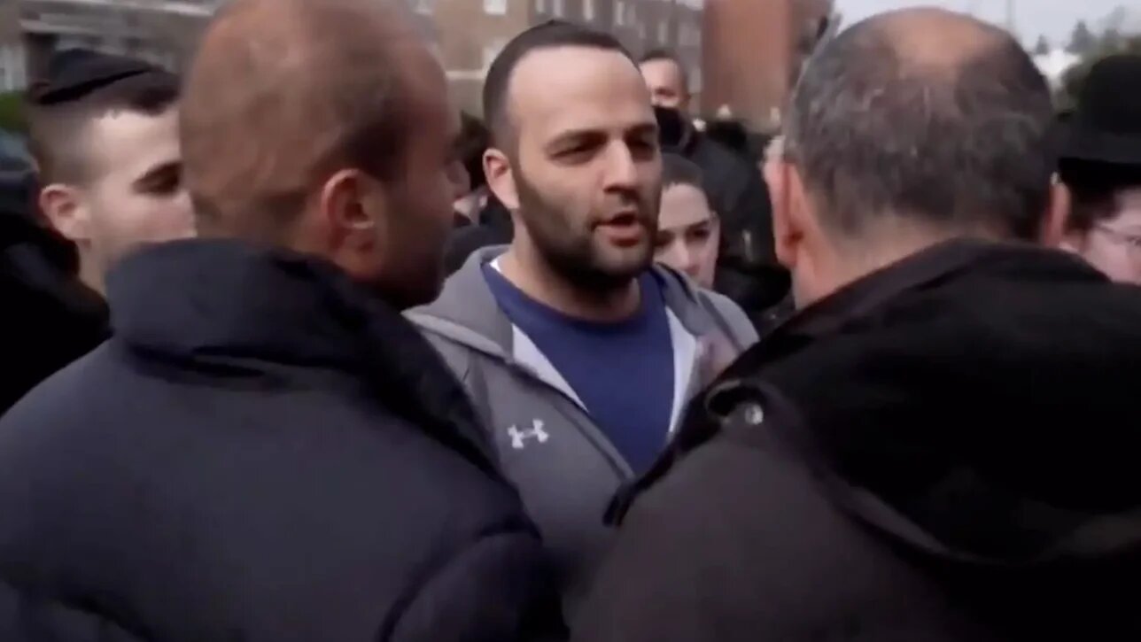 Special Constable David Soffer seen in a crowd that surrounded an Al Jazeera film crew in Golders Green. (Screengrab/X/MEE)