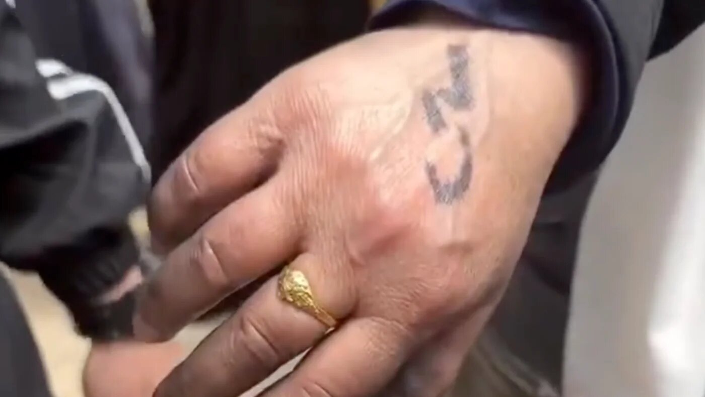 Israeli forces marked Palestinian women with numbers on their hands before allowing them to briefly enter and check their homes on 13 April 2026 (Instagram/@raya.orouq/screenshot)