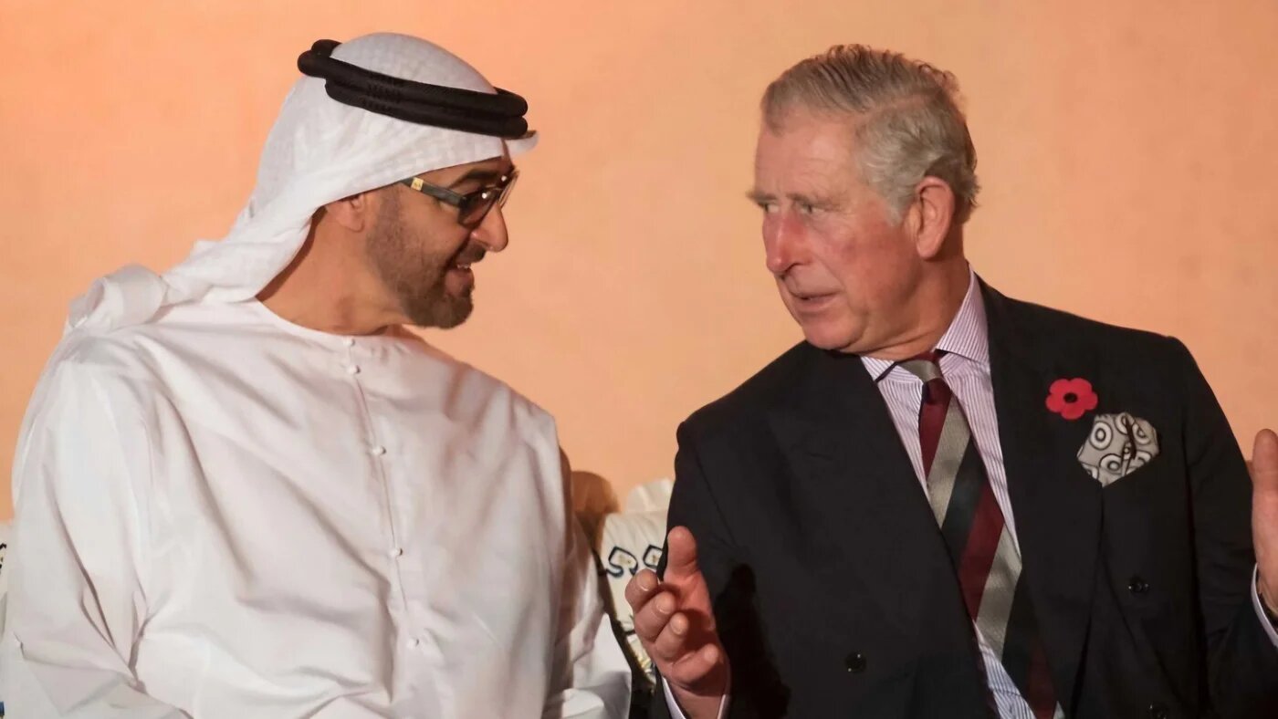 Sheikh Mohamed bin Zayed Al Nahyan, the crown prince of Abu Dhabi, speaking to the then-prince of Wales in Abu Dhabi on 7 November 2016. (AFP)