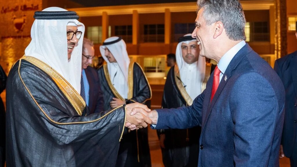 Bahrain's Foreign Minister Abdullatif bin Rashid al-Zayani (left) receiving his Israeli counterpart Eli Cohen in Manama, 3 September 2023 (AFP)