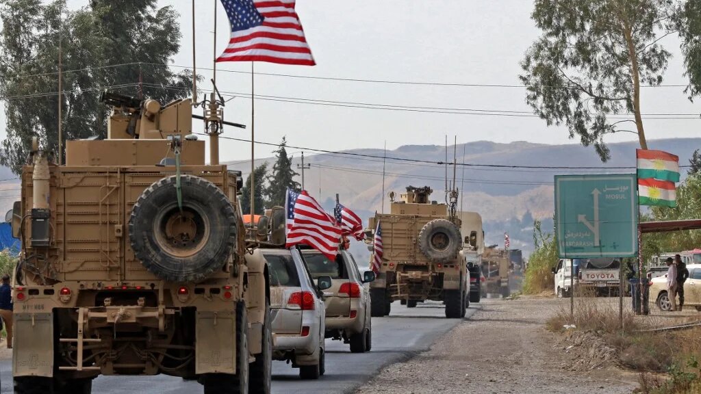 A convoy of US military vehicles arrives in Iraq 