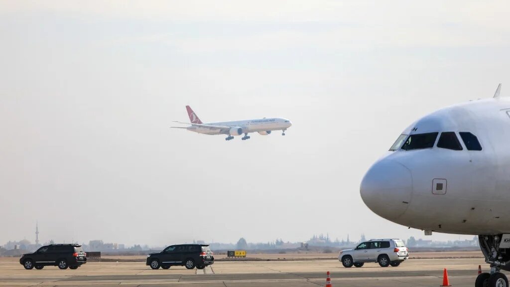 A Turkish Airlines aircraft carrying a diplomatic delegation from Ankara and an aid shipment provided by the Turkish Red Crescent, lands at the Damascus International Airport in the Syrian capital on January 23, 2025. (Bakr ALKASEM / AFP)