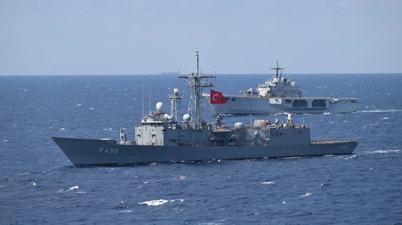 A picture taken from the Turkish Navy drone-carrying amphibious assault ship, TCG ANADOLU (L-400) shows Turkish Frigate (F-496) and Italian vessel San Giorgio (L 9892) during Nato’s premier enhanced Vigilance Activity (eVA) Neptune Strike 2025-3 in the Adriatic Sea on 24 September 2025 (AFP)