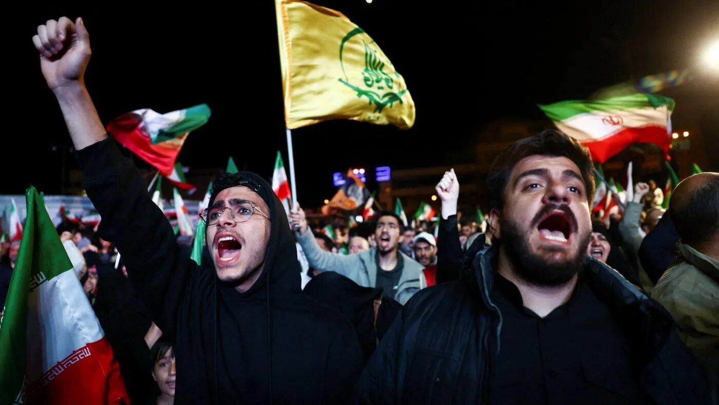 People gather after a two-week ceasefire in the Iran war was announced, in Tehran, 8 April 2026 (Reuters)