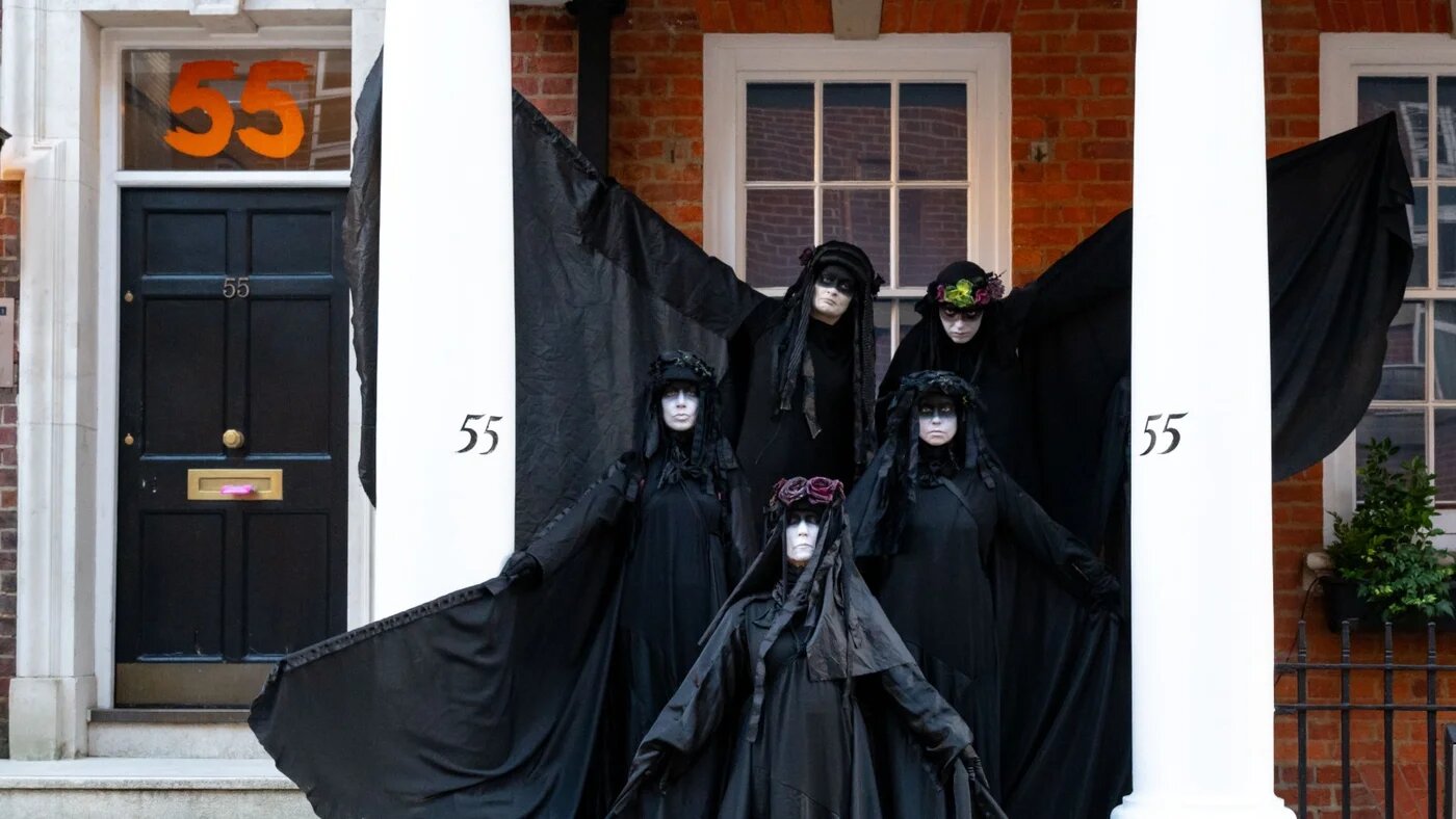 Oil Slickers seen posing in front of 55 Tufton Street. Extinction Rebellion Oil Slickers staged a symbolic performance protest in Whitehall moving in formation and stopping at Parliament Square, the Ministry of Defence, and 55 Tufton Street to highlight what they describe as government failure to meet climate commitments. They carried banners reading “Tell the Truth”, “A Better World Is Possible” and “1.5°C Is Dead”.Andrea Domeniconi / SOPA Images via Reuters Connect, 20 Dec 2025