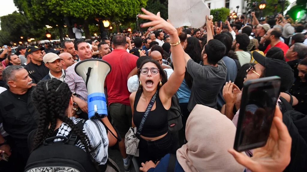 Tunisians protest against President Kais Saied during a demonstration on 4 October 2024, in Tunis (Fethi Belaid/AFP)