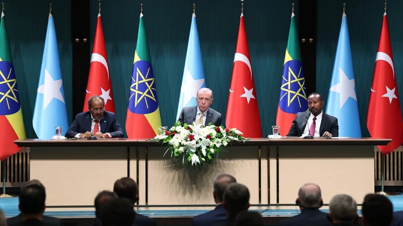 Somali President Hassan Sheikh Mohamud (left), Turkish President Recep Tayyip Erdogan (centre) and Ethiopian Prime Minister Abiy Ahmed (right) address the media during the signing of the Ankara Declaration on 11 December in Ankara (Turkish Presidency/Handout)