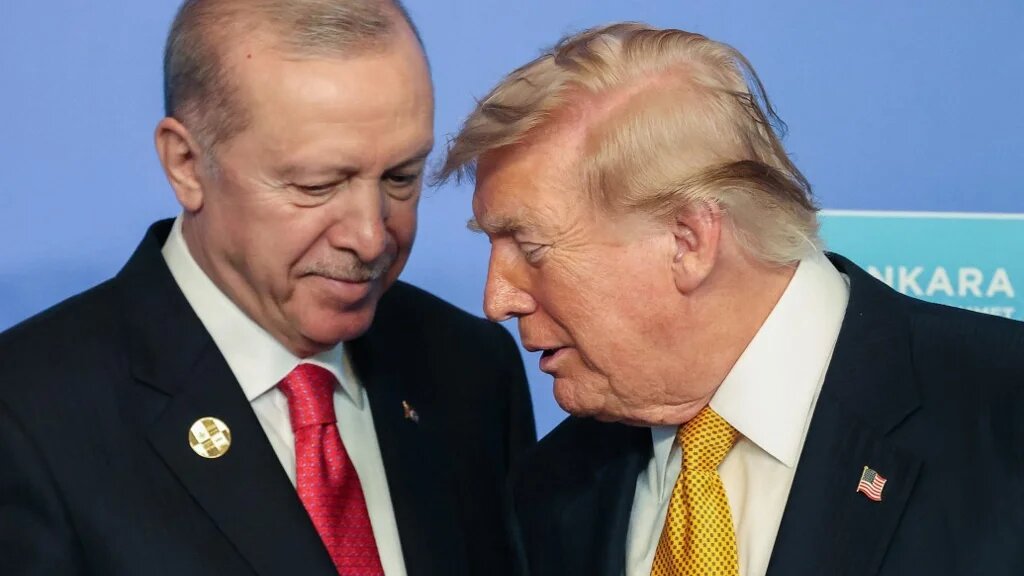 Turkey's President Recep Tayyip Erdogan and US President Donald Trump speak as they join NATO leaders for a family photo during the NATO Summit at Bestepe Presidential Compound in Ankara, Turkey, July 8, 2026. (Ludovic MARIN / POOL / AFP)