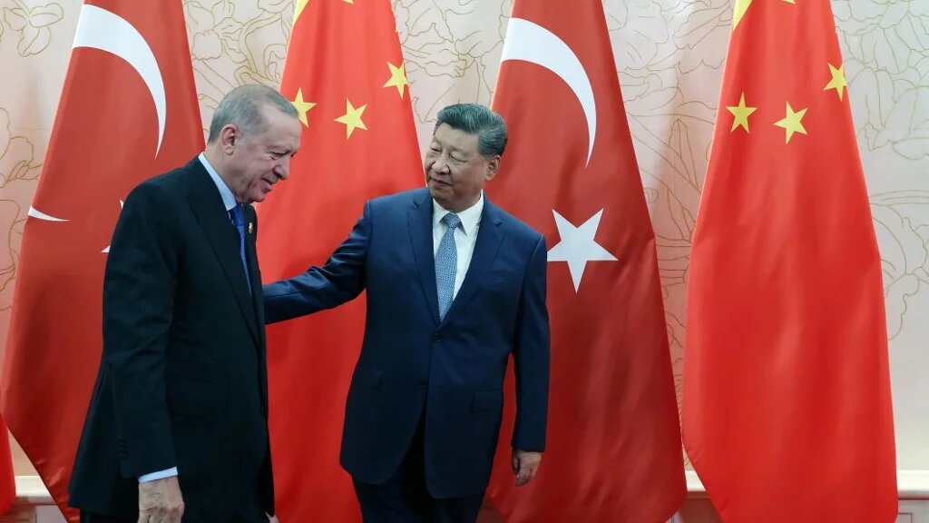 This handout photograph taken and released by Turkish Presidency Press Office on August 31, 2025, shows Turkish President Recep Tayyip Erdogan (L) shaking hands with China’s President Xi Jinping (R) as part of his visit to attend Shanghai Cooperation Organization (SCO) summit in Tianjin. (AFP)
