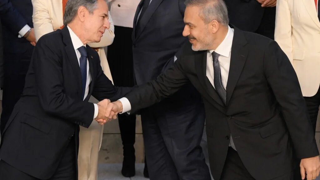 US Secretary of State Antony Blinken (left) with Turkey's Foreign Minister Hakan Fidan at a Nato meeting in Brussels last week (John Thys/AFP)