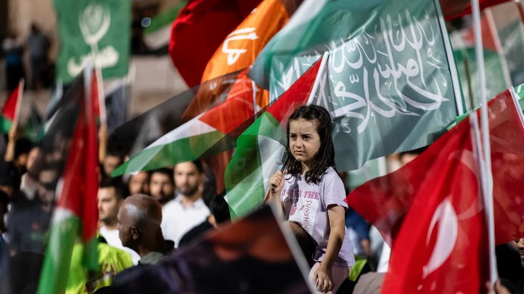 Pro-Palestinian demonstrators wave Palestinian flags as they take part in a rally to protest the death of the Hamas leader Ismail Haniyeh, following evening prayers in Fatih district of Istanbul on July 31, 2024. (Kemal Aslan / AFP)