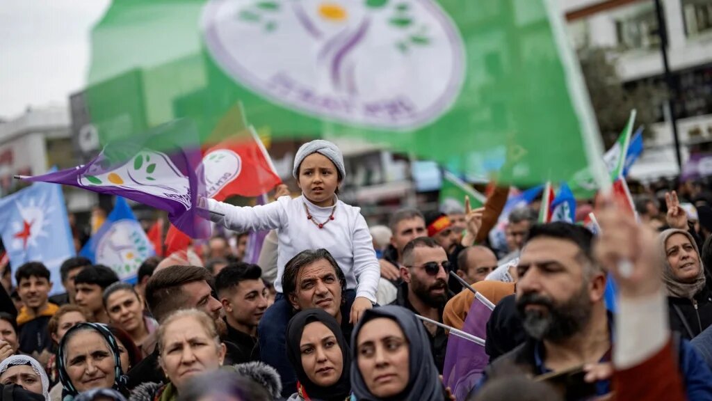 Supporters of the pro-Kurdish Peoples DEM Party attend a rally for the Turkish Municipal elections to be held on March 31, in Esenyurt Square, in Istanbul on February 25, 2024.(Yasin Akgul/AFP)