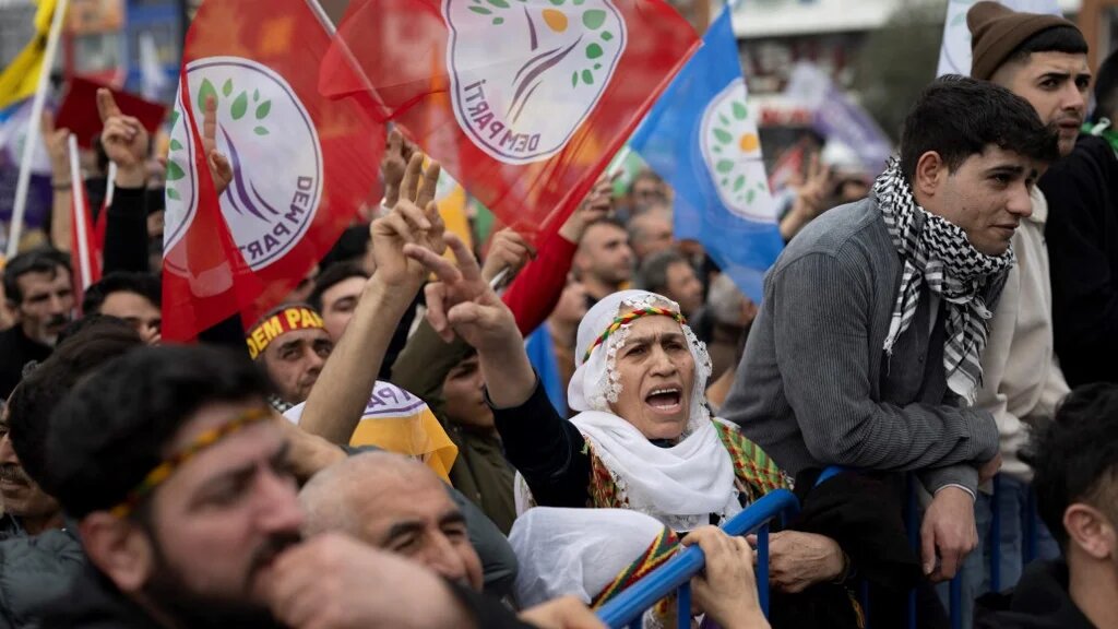 Supporters of the pro-Kurdish Dem Party attend a rally in Esenyurt Square, in Istanbul on 25 February (Yasin Akgul/AFP)