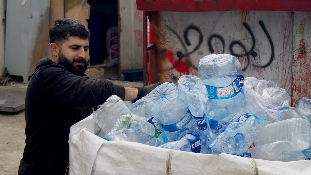 The plastic waste that Mustafa Yaşar collects will be melted into raw plastic pellets in Emir Yaşar's granule workshop in Istanbul. Both struggle to keep up with rising costs. (Naomi Cohen / MEE)