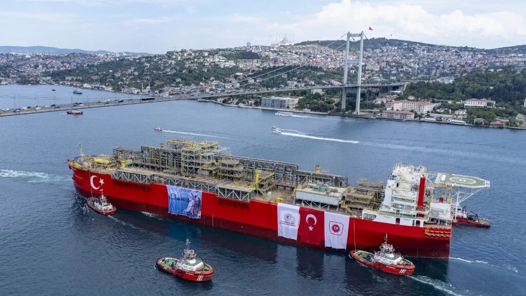 This aerial photograph shows Turkey's first floating natural gas production platform "Osman Gazi" passing through the Bosphorus, in Istanbul, on May 29, 2025. (Yasin AKGUL / AFP)
