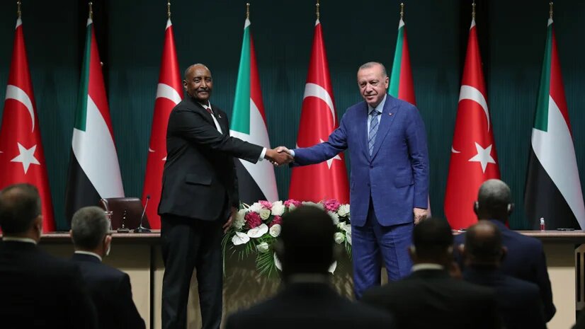 Turkish President Recep Tayyip Erdogan shakes hands with Sudan's Chairman of the Transitional Sovereignty Council General Abdel Fattah al-Burhan in Ankara, Turkey on 12 August 2021 (Turkish Presidency)