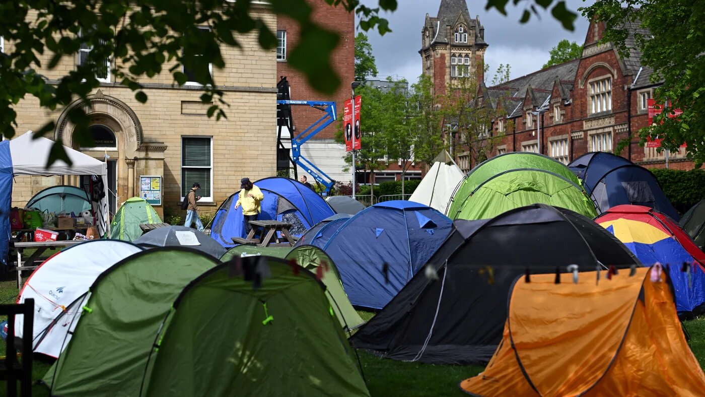 Students set up tents as part of the Leeds University pro-Palestine encampment (Oli Scarff/AFP)