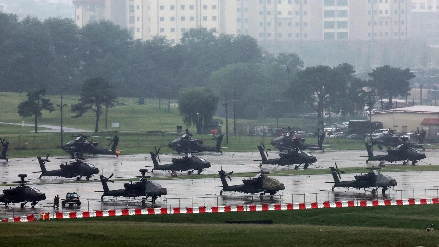 US Army AH-64 Apache helicopters are seen at Camp Humphreys in Pyeongtaek, South Korea, 21 August 2026 (Yonhap/AFP)