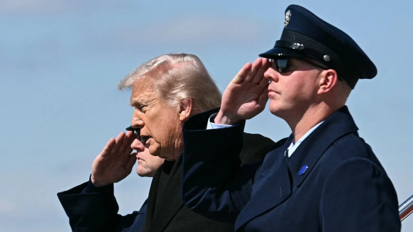 US President Donald Trump steps off Air Force One upon arrival at Dover Air Force Base, Delaware, on 18 March 2026. Jim WATSON / AFP