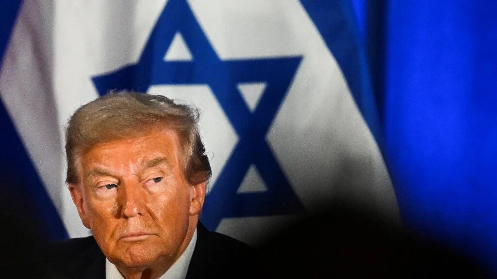Former US President and Republican presidential candidate Donald Trump attends a remembrance event to mark the first anniversary of the Hamas attack on Israel at Trump National Doral golf club in Miami, Florida, on October 7, 2024. (Chandan Khanna / AFP) 