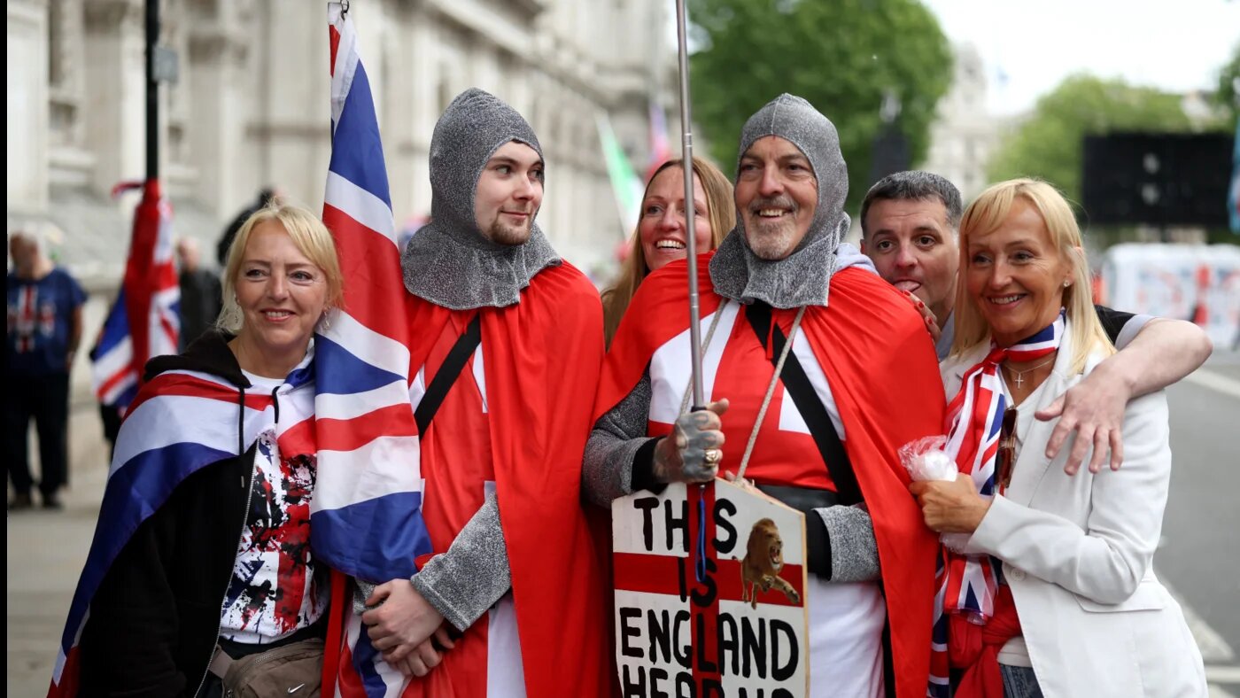 Marchers at the Unite the Kingdom rally, organised by the far-right agitator Tommy Robinson, real name Stephen Yaxley-Lennon, are pictured in London on 16 May 2026 (Toby Shepheard/AFP)