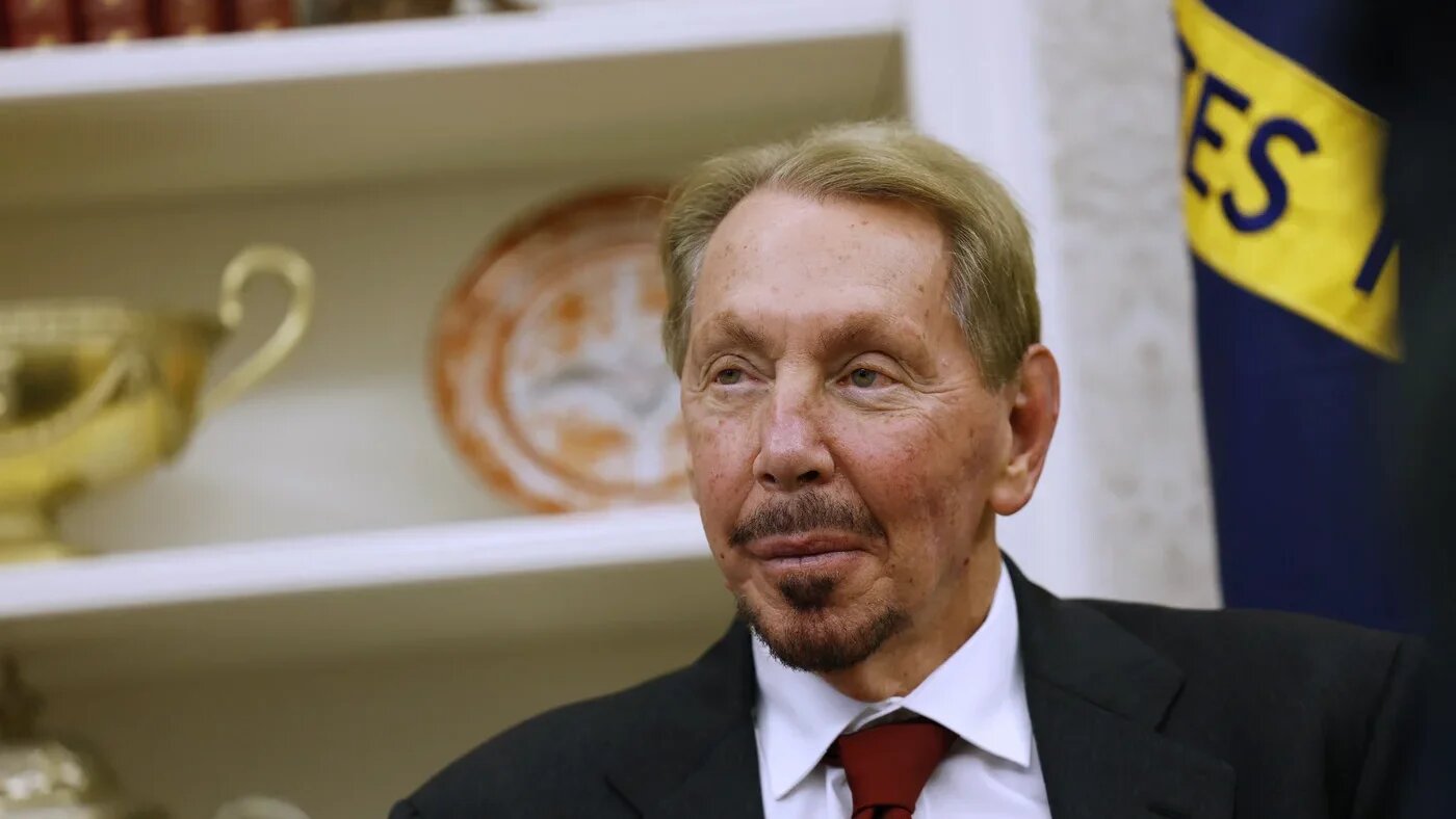 Larry Ellison listens as US President Donald Trump speaks to reporters in the White House on 3 February 2025 (Anna Moneymaker/Getty Images via AFP)