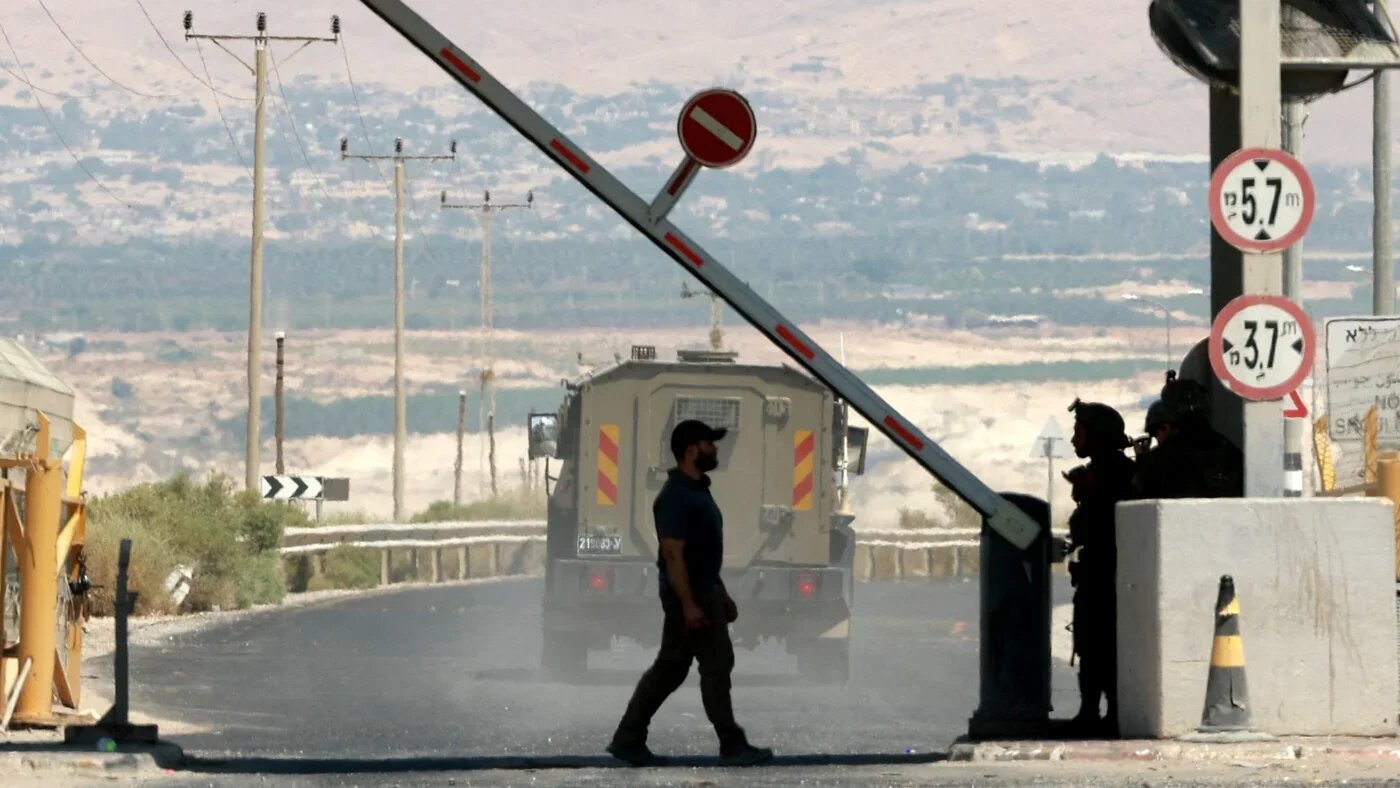 A man walks at a barrier at the Allenby Bridge Crossing between the West Bank and Jordan, 8 September 2024 (Reuters/Ammar Awad)