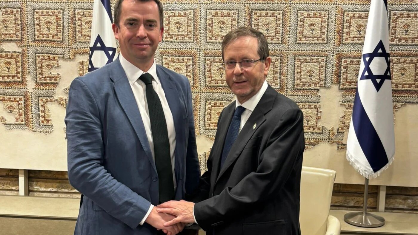 Calum Miller posing for a photograph with Israeli President Isaac Herzog in February 2026. (Screengrab/X/Liberal Democrat Friends of Israel)