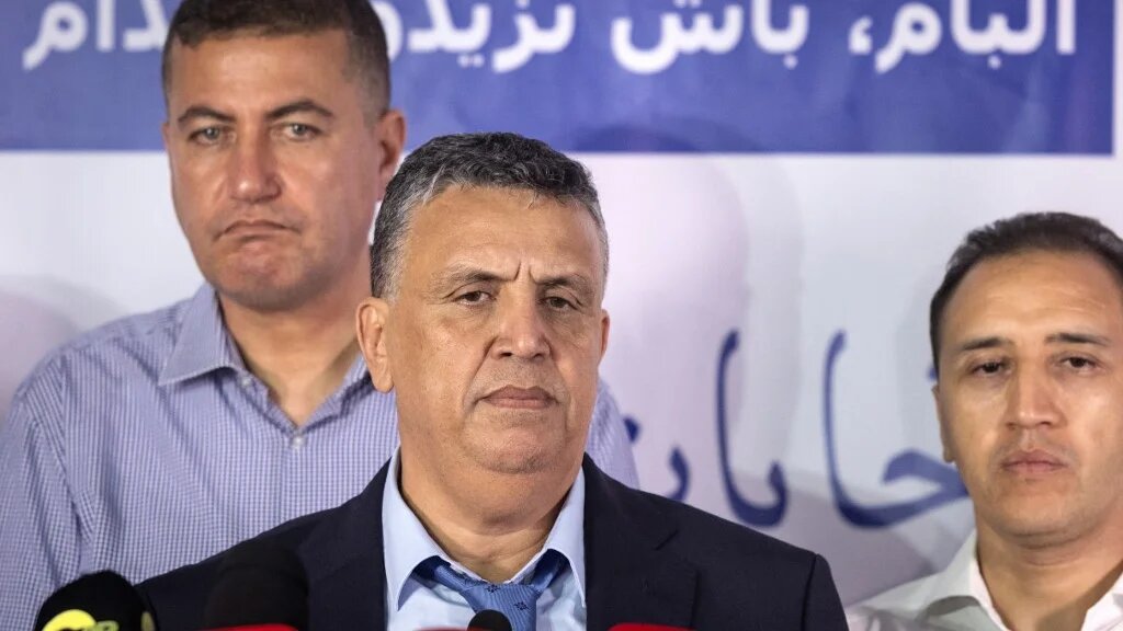 Abdellatif Ouahbi et des membres du Parti authenticité et modernité (PAM) après les élections locales et législatives, le 9 septembre 2021 à Rabat (AFP/Fadel Senna)