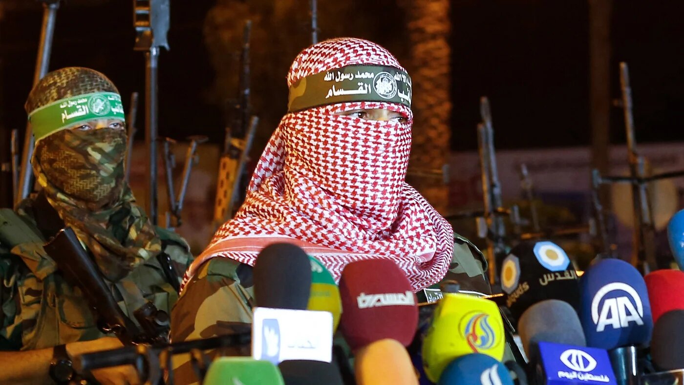 Abu Obeida, spokesperson for the Izz al-Din al-Qassam Brigades, the armed wing of Hamas, speaks in Gaza City on 8 July 2015 (Mohammed Abed/AFP)