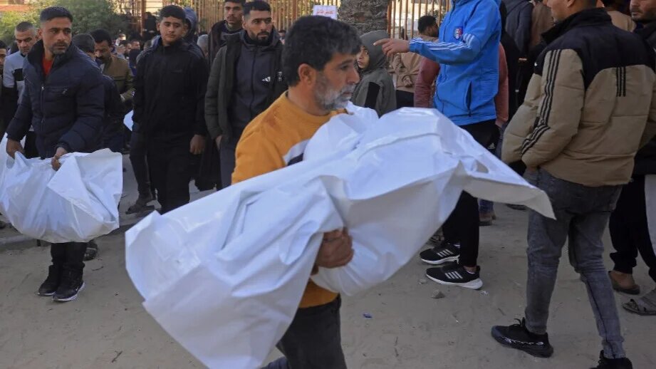 Palestinians carry the bodies of people reportedly killed in an Israeli air strike during their funeral in Khan Younis, southern Gaza Strip, on 31 January 2026 (Bashar Taleb/AFP)