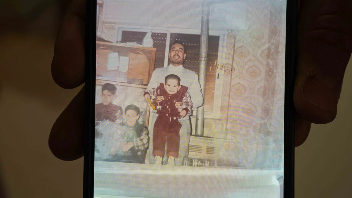An old family photo of Adel al-Natour, co-founder and former member of Palestinian Islamic Jihad (Anagha Subhash Nair/MEE)