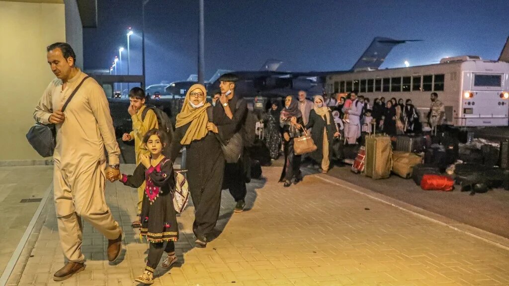 Evacuees from Afghanistan arrive at the al-Udeid air base in Qatar