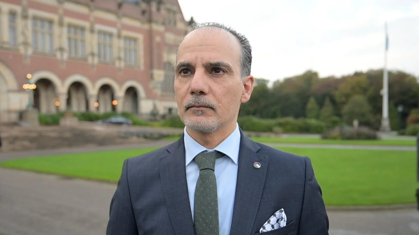 Ammar Hijazi, Palestine's ambassador to the Netherlands and permanent representative to international organisations in The Hague, speaking to Middle East Eye on 22 October 2025 outside the Peace Palace, The Hague (MEE/Mouneb Taim)