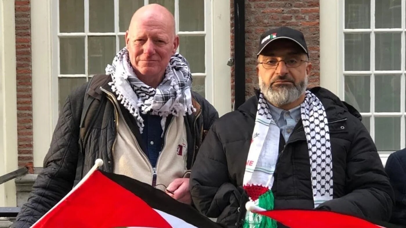 Amin Abu Rashed (right) stands next to Oscar Bergamin (left), a friend and the campaign spokesperson calling for the release of Abu Rashed  (MEE/Supplied)