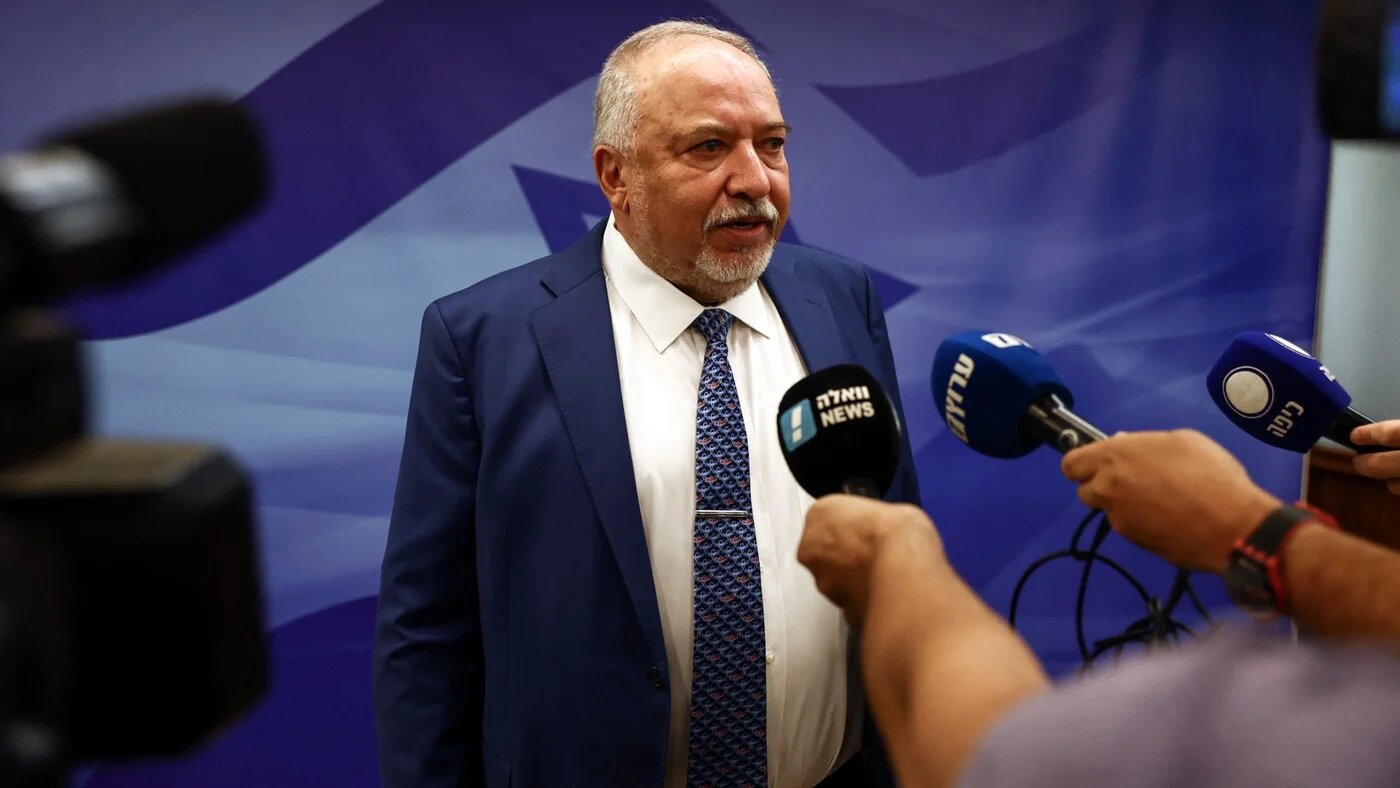 Avigdor Lieberman, then Israel's finance minister, speaks to members of the media in Jerusalem on 11 September 2022 (AFP/Ronen Zvulun)